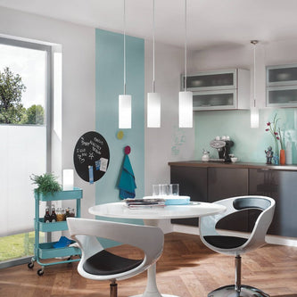 Eglo pendant lights in an open plan kitchen and dining room