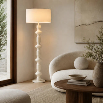 Telbix floor lamp beside an armchair