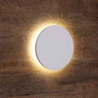 Oriel wall light with a warm backlit glow