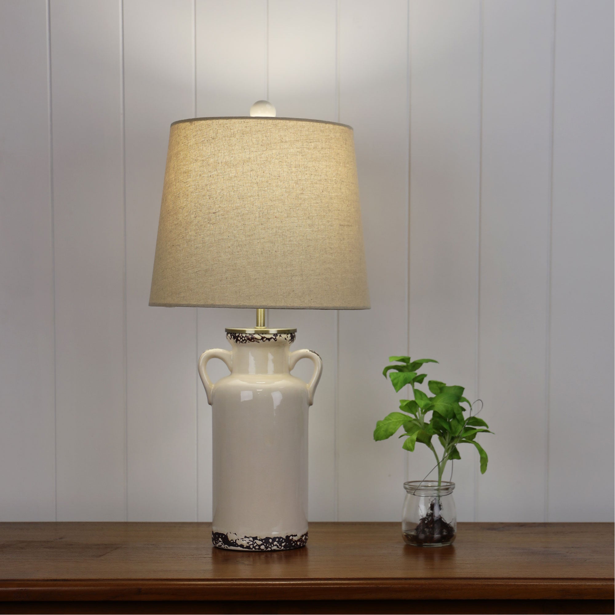 Whitby Distressed White Ceramic & Natural Linen Shade Table Lamp With Harp Shade