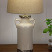 Whitby Distressed White Ceramic & Natural Linen Shade Table Lamp With Harp Shade
